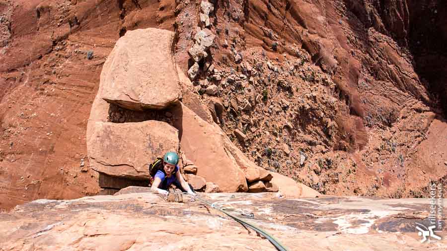Coming up the direct 'Coyote Calling' finish on P3 of Fine Jade on the Rectory. [Castle Valley, UT]