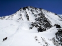 Looking up the Aiguille du Goûter from just beyond the Tete Rousse hut.  The ascent ridge is just to the right of the Grand Couloir.  You can very clearly see the new Gouter hut and just make out the old Gouter hut were the climb to the Aiguille tops out.
