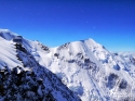 New Goûter Hut as viewed from the Old Goûter Hut and the start of the descent of the Auguillere