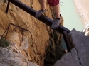 Traversing the support beam.