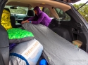 Setting up the Synergy Sheet on the NeoAir Dream mattress. Note the green attachment loops that mate with the Thermarest line of blankets and quilts.