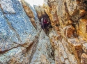 Looking up P1 at the tunnel section of the chimney. Liberty Bell via 'Beckey Route' - North Cascades, WA.