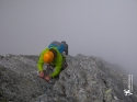 Topping out one of the final pitches of the N ridge of Piz Badile. Trying to escape ominous thunder clouds.